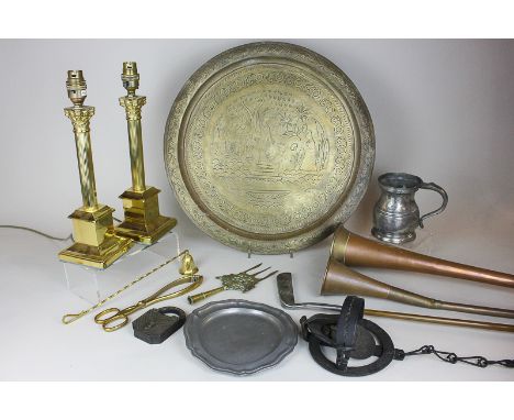 A Shakespeare fishing rod, another fishing rod, a golf club, two copper and brass hunting horns and other items of brass and 