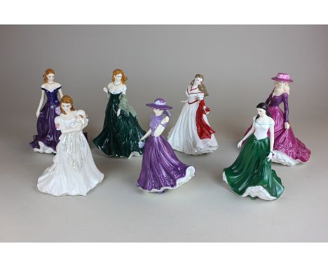 A collection of seven Royal Worcester porcelain figures of ladies, Caitlin, Charlotte, Poppy, Isla, Scotland, Olivia, England