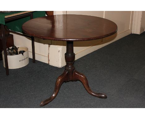A George III mahogany circular tilt-top tea table on tripod base, 87cm diameter