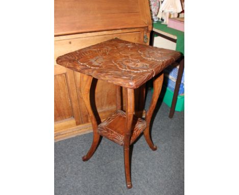 An Japanese carved rosewood occasional table square top deeply carved with flowers, on cabriole legs with under shelf, 45cm