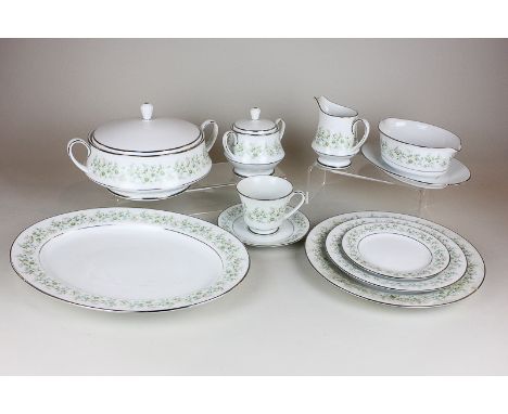 A Noritake porcelain Savannah pattern part dinner and tea service comprising a platter, two vegetable tureens, six dinner, de