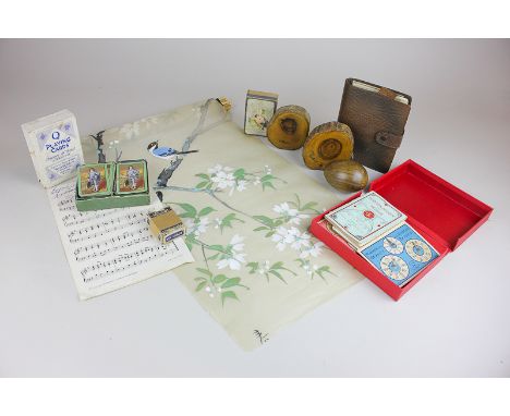 A collection of playing cards, a Bezique game, two pieces of petrified wood, now as paperweights, and other items