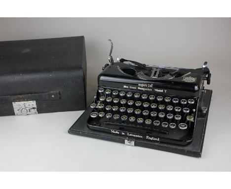 An Imperial The Good Companion Model T typewriter, made in Leicester, in travel case