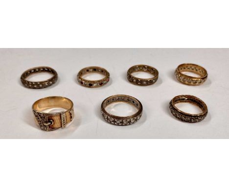 SEVEN 9CT GOLD & OTHER RINGS, all set with paste stones comprising 9ct gold belt and buckle style ring, size M, the other six