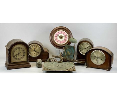 VARIOUS CLOCKS comprising 19th century postman's clock, pink and cream enamelled dial, with black Roman numerals, beech surro