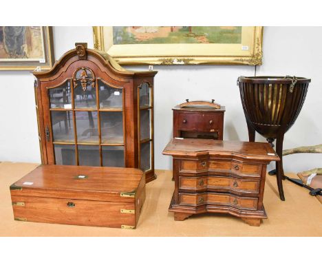 A 20th Century Glazed Hanging Wall Cupboard, 68cm by 71cm, An Inverted Breakfront Miniature Three Height Chest of Drawers, wi