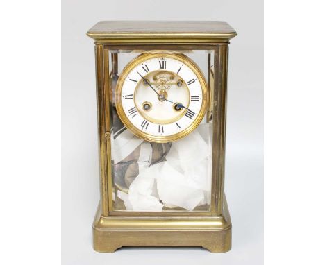 A French Brass Four Glass Clock by Richard &amp; Co, with mercury pendulum and key, 28cm highOne of the mercury tubes to the 