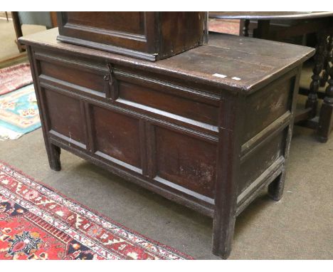 An Early 18th Century Oak Coffer, with moulded panel front, 110cm by 52cm by 68cm