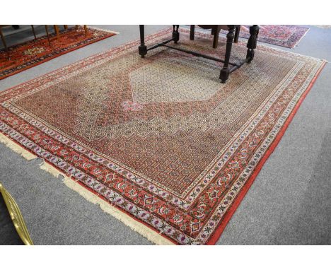 Bidjar Carpet, the stepped lozenge field with ice blue central panel of Herati design enclosed by narrow samovar borders, 334