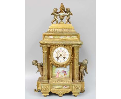 A Gilt Metal and Porcelain-Mounted Mantel Clock Garniture, circa 1890, on gilt painted wooden bases, clock size 52cm high, ga