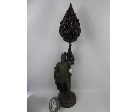 A Spelter Figural Lamp Base, with ruby coloured flame shade held aloft, approx 84 cms