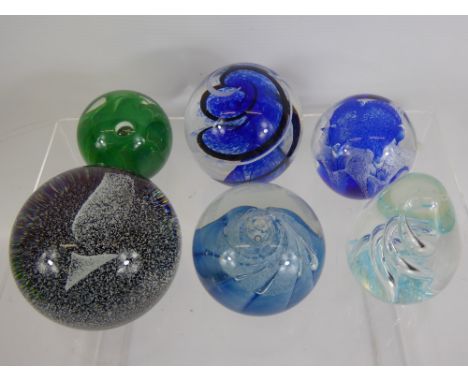 A Quantity of Glass Paperweights, including Caithness 'Zephyr', Caithness 'Sea Gem' amongst others. (6)