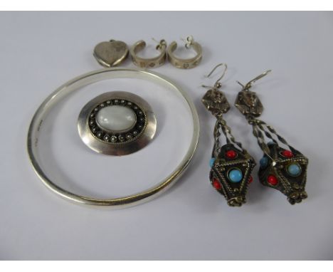 A Miscellaneous Collection of Jewellery, including solid silver bangle, pair of Egyptian silver earrings, silver Israeli moon