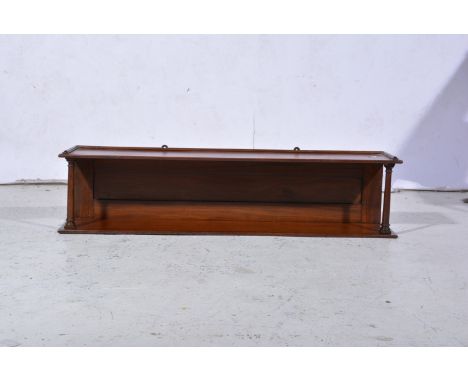 Mahogany wall mounted open shelf, with column supports, width 92cm.