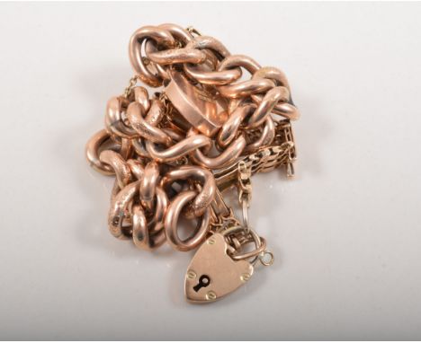 9ct hollow curb link bracelet, with a hallmarked padlock clasp and a yellow metal gate bracelet with a 9ct padlock clasp, (2)