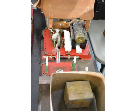 Mamod stationary steam engine, set on a meccano base together with a Mamod line shaft and a Mamod polishing machine.