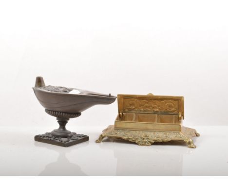 Spanish style porcelain figure of a Huntsman, 26cm, a bronzed model of a Roman oil lamp and other items.
