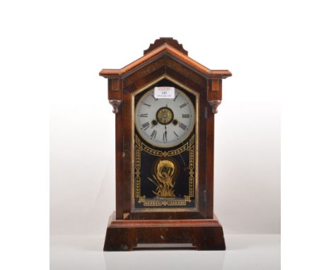 American simulated rosewood shelf clock, white enamel dial, alarm clock, striking on a bell, 47cm.