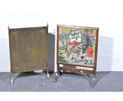 Oxidised brass fire screen, and an oak framed fire screen/table with tapestry inset panel, (2).