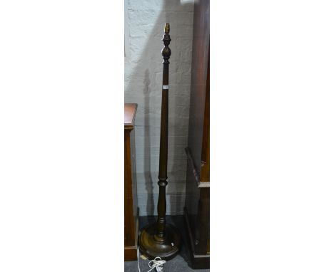 Mahogany standard lamp, tapering reeded column, circular base.