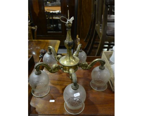 Gilt metal five light centre light fittings, scrolled branches, frosted shades, 41cm drop, copper three light fittings, frost