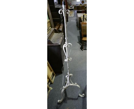 Painted wrought iron pedestal lamp.
