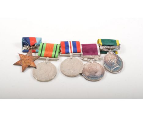 Medals:  group of five, including Territorial Efficiency Medal to 88128 W.O.CL.2.D.PATTERSON.R.A. and a Long Service Good Con