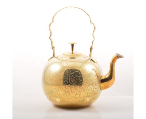 Large copper kettle, 34cm, a brass trivet, an Indian brass kettle, a pair of brass candlesticks and a crackle glazed vase ser