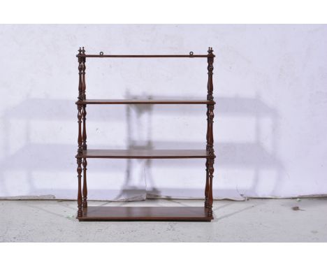 19th Century mahogany four tier graduated wall shelf unit, with baluster turned supports, width 61cm.