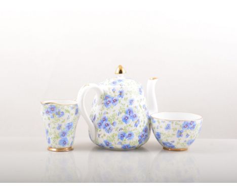 Spode Art Deco part coffee set, Copeland Chinese Rose tableware and a pottery tea set.