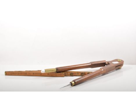 Beechwood measure, a shoe sizer, blackboard compass and a Shannon ruler.