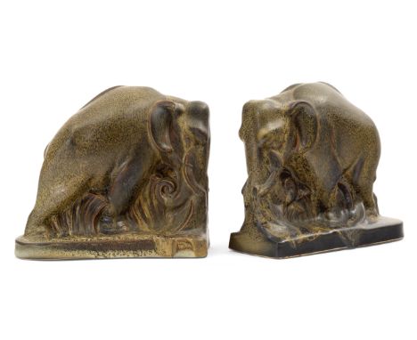 Harold Brownsword (1885-1961) for Carter Stabler Adams Poole PotteryPair of elephant bookends, circa 1930Earthenware, mottled