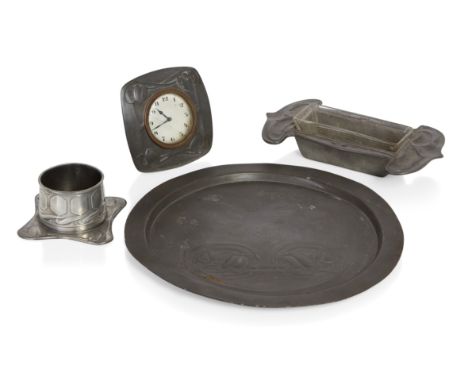 Archibald Knox (1864-1933) for Liberty & Co.Various Tudric; easel timepiece, model No.0482, butter dish with spade shaped han