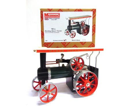 A MAMOD NO.TE1A, STEAM TRACTOR  complete with scuttle, burner and control rod, boxed. Condition Report : Very good condition.