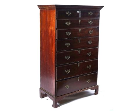 AN 18TH CENTURY TALL IRISH MAHOGANY CHESTWith two short over six long graduated drawers, on bracket feet, 102cm wide; 162cm h