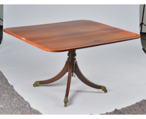 A GEORGE IV KINGWOOD BANDED MAHOGANY BREAKFAST TABLEThe rectangular snap top on four downswept supports, 134cm wide; 105cm de