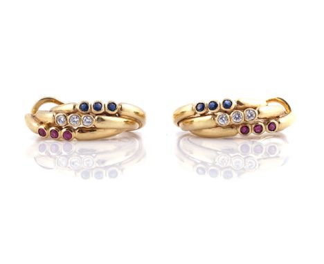 A PAIR OF GARRARD 18CT GOLD, SAPPHIRE, DIAMOND AND RUBY EARCLIPS.Each in a triple curved design, mounted with circular cut ge