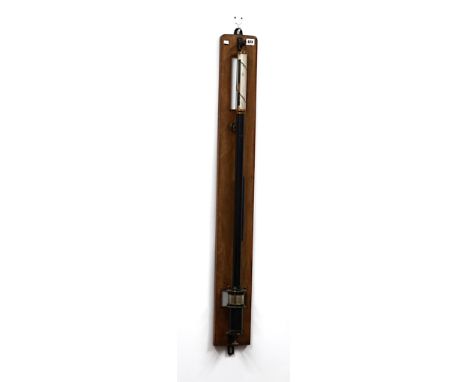 A BLACK PAINTED BRASS STICK BAROMETERCirca 1940sDetailed F D &amp; Co London, No B.82 1941, mounted on a mahogany backboard, 