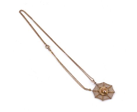 A GOLD PENDANT WITH A GOLD NECKCHAIN (2)The pendant designed as a spider in a web, detailed 14 K, the neckchain detailed 14 K