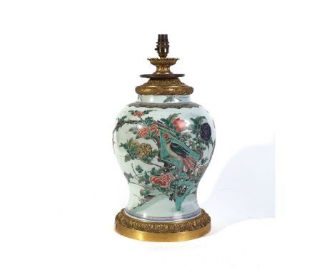 A CHINESE FAMILLE-VERTE ORMOLU- MOUNTED VASE ADAPTED AS A LAMPThe porcelain Kangxi, the mounts 19th centuryOf broad baluster 