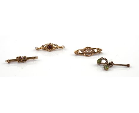 FOUR BAR BROOCHES (4)Comprising; a gold, ruby and seed pearl bar brooch with a central flowerhead motif, between foliate side