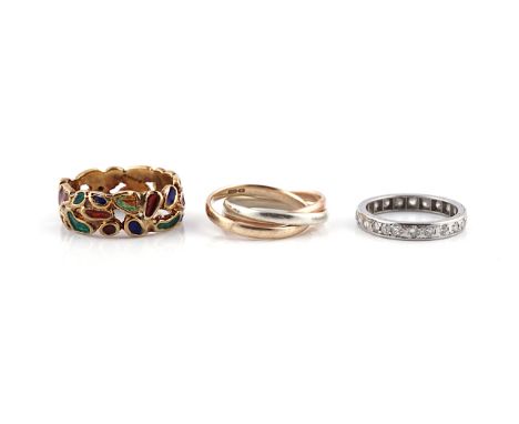THREE RINGS (3)Comprising; a diamond full eternity ring, set with circular cut and cushion shaped diamonds, ring size I, gros