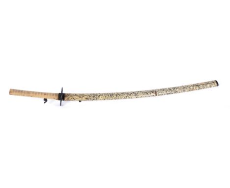 A JAPANESE SWORD (KATANA)Probably Edo period, Mid 19th-CenturyThe 68cm curved steel blade mounted within an undyed shagreen h