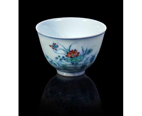 A CHINESE SMALL DOUCAI `DUCKS AND LOTUS' CUPBlue six character Kangxi mark and probably of the periodPainted on the exterior 