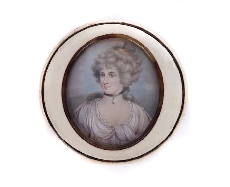 A CIRCULAR IVORY BOX AND COVEREarly 19th CenturyThe cover inset with a glazed oval panel housing a portrait miniature of lady