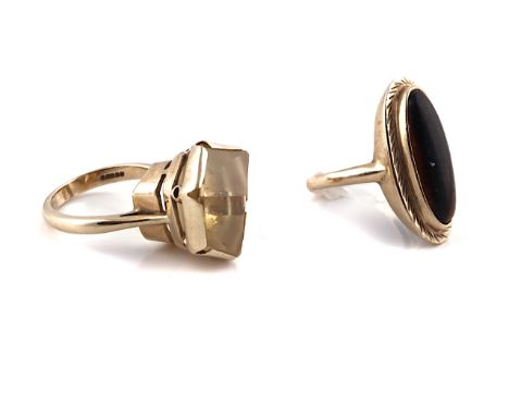 TWO GOLD AND GEM SET RINGS (2)Comprising; a 9ct gold ring mounted with a hexagonal cut citrine, London 1962, ring size N and 
