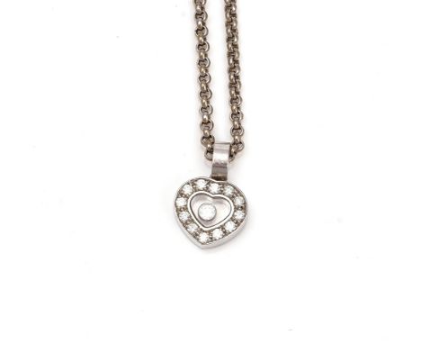 A CHOPARD HAPPY DIAMONDS PENDANT NECKLACEThe heart shaped pendant with a central floating diamond within a surround of twelve