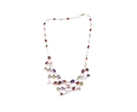 A SILVER AND VARICOLOURED GEMSTONE NECKLACESpectacle set with a variety of oval cut coloured gemstones, including amethyst, p