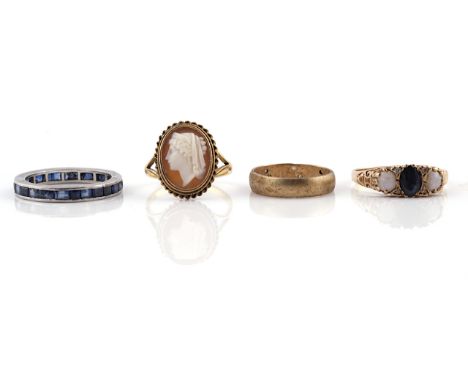 A 9CT GOLD, OPAL, DIAMOND AND SAPPHIRE RING AND THREE FURTHER RINGS (4)Comprising; a 9ct gold ring mounted with an oval cut s