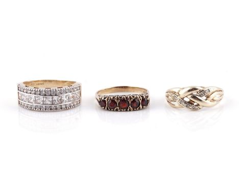 A 9CT GOLD AND GARNET FIVE STONE RING AND TWO FURTHER 9CT GOLD AND GEM SET RINGS (3)The garnet ring mounted with a row of gra